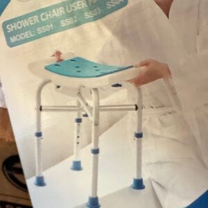 Adjustable Shower Chair with Blue Seat. New in box.  Assembly needed